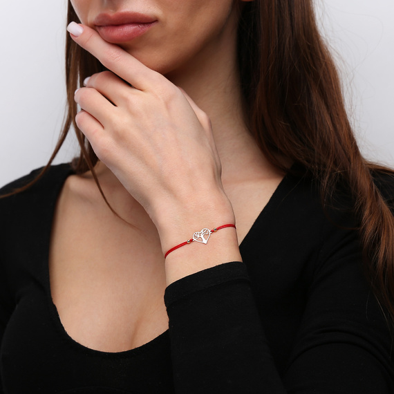 585 Goldarmband auf roter Kordel durchbrochenes Engelsarmband