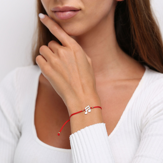 585 Goldarmband an roter Schnur Note