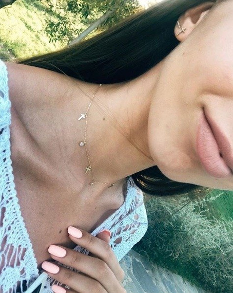 Halskette aus Gold mit Kreuzen und Zirkonen 585