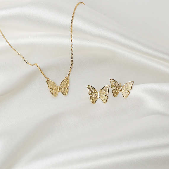 Gold 585 durchbrochene Schmetterlingsohrringe an einem Pfosten