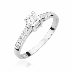 Goldverlobungsring mit 0,13 Karat Diamanten Illusionseffekt